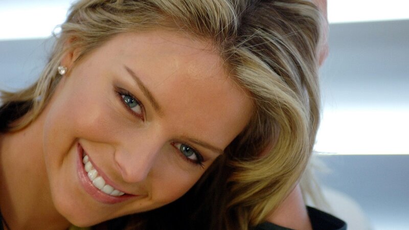 smiling woman with blonde hair