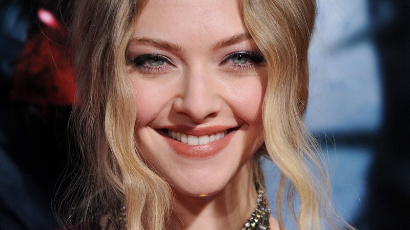 smiling woman with blonde hair