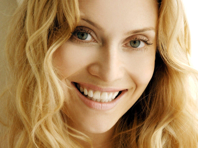 smiling woman with blonde hair