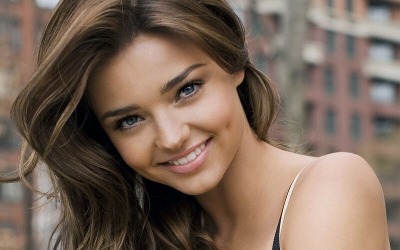 smiling woman with blue eyes