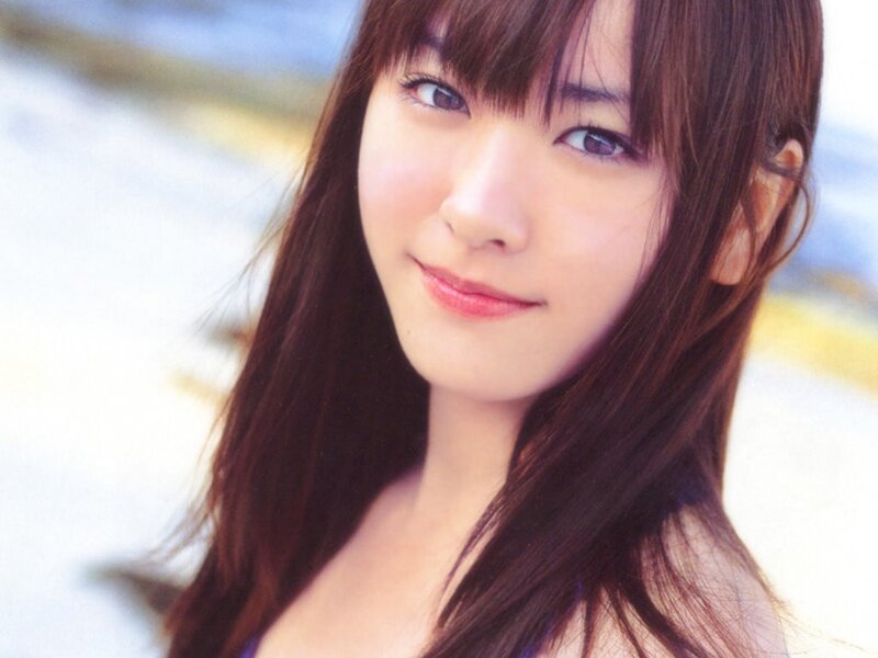 smiling woman with brown hair