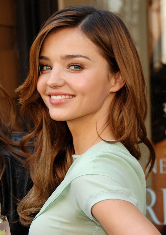 smiling woman with brown hair