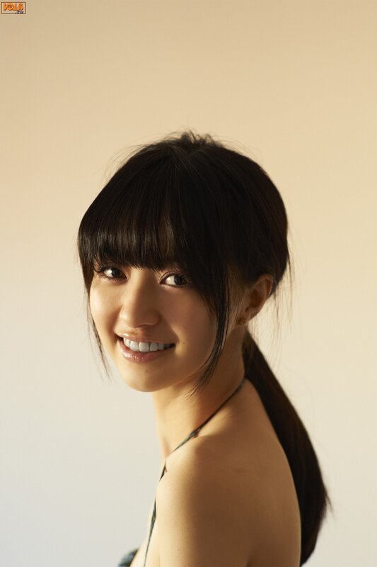 smiling woman with dark hair