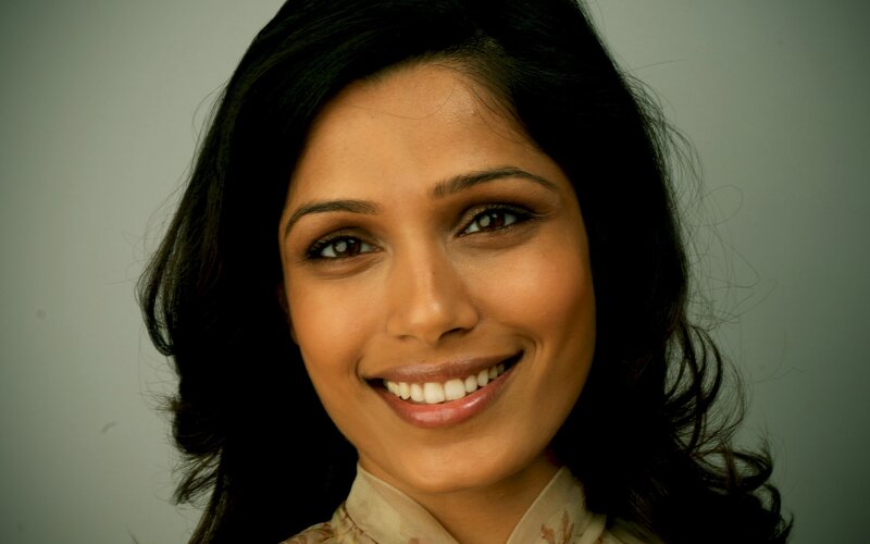 smiling woman with dark hair