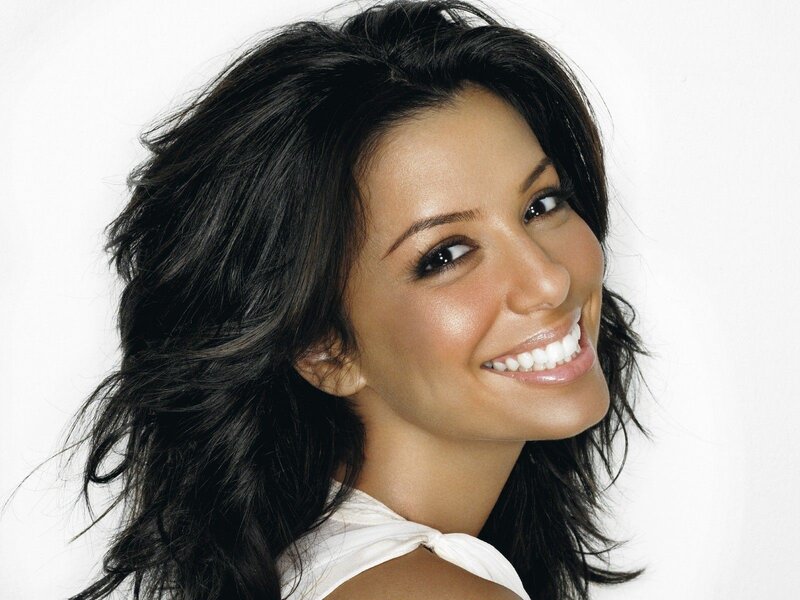smiling woman with dark hair