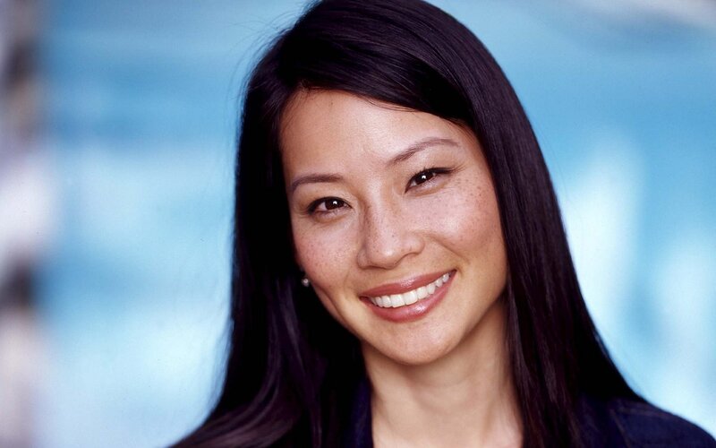 smiling woman with dark hair