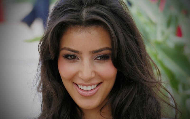 smiling woman with dark hair