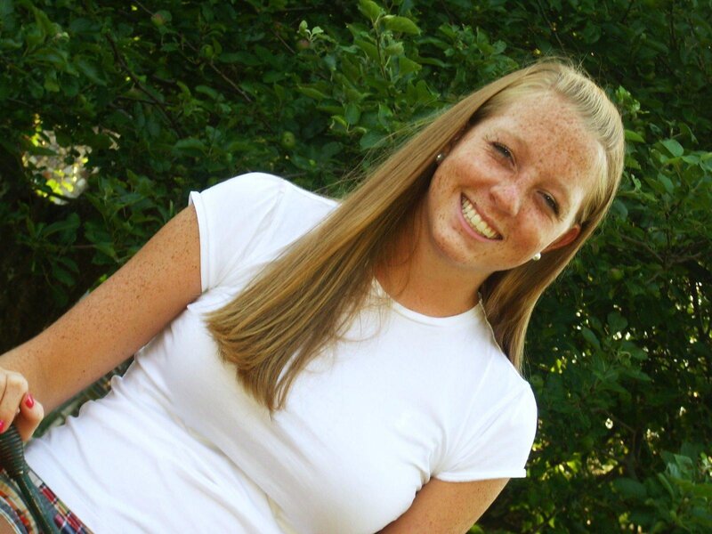 Smiling woman with freckles