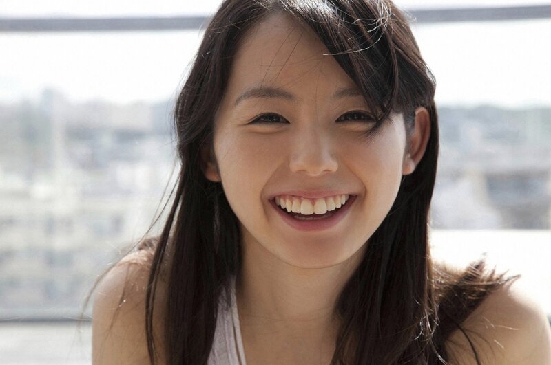 smiling woman with long hair