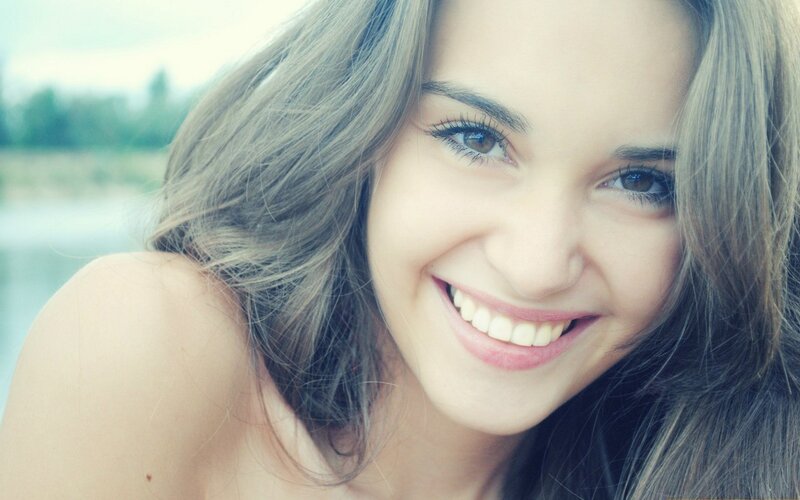 smiling woman with long hair