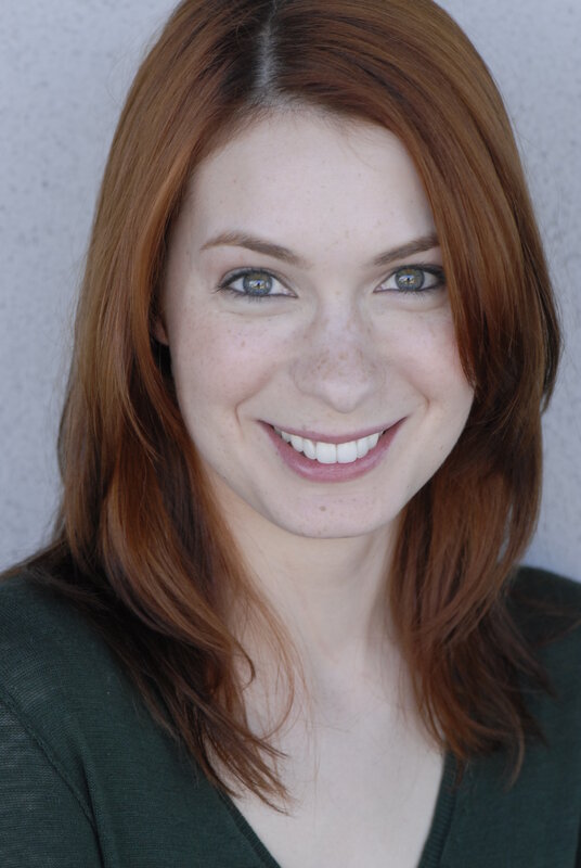 smiling woman with red hair