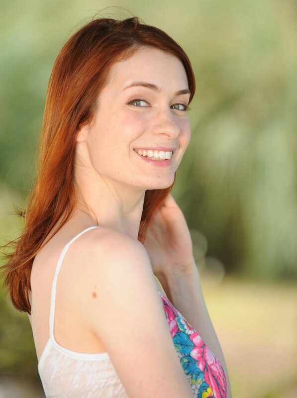 Smiling woman with red hair