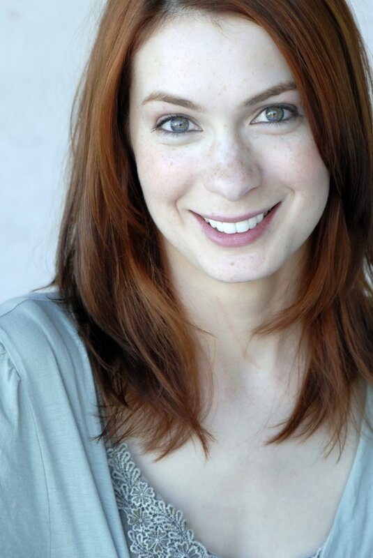 smiling woman with red hair