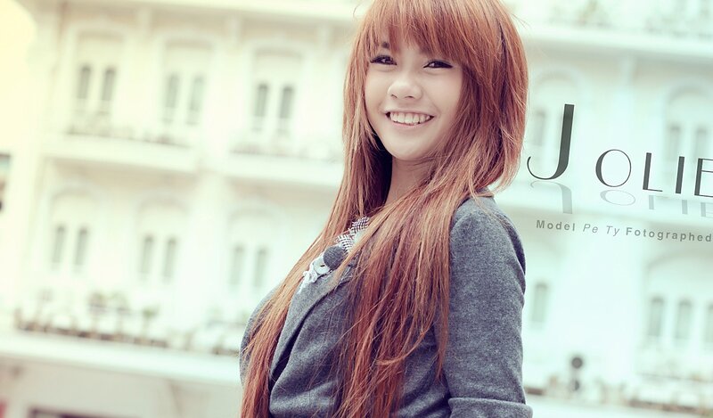 smiling woman with red hair