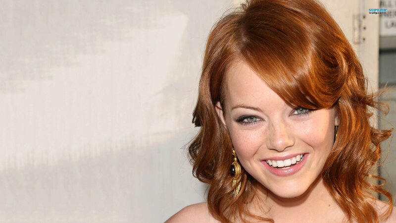 Smiling woman with red hair