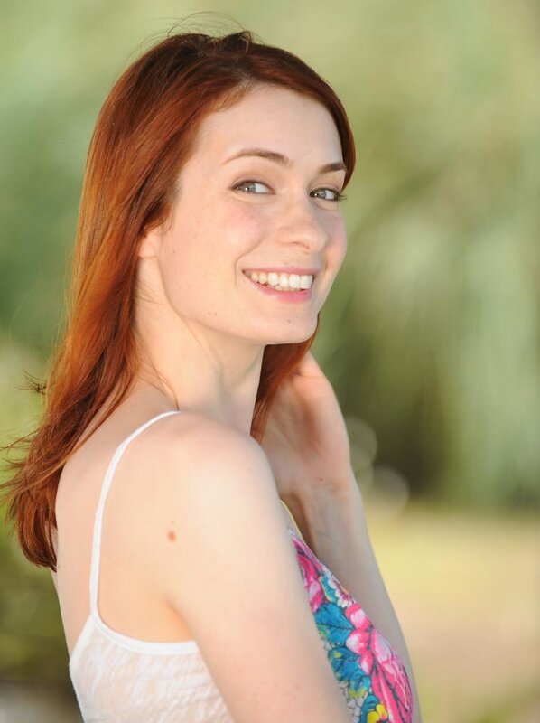 smiling woman with red hair