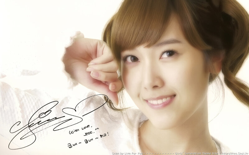 smiling woman with signature