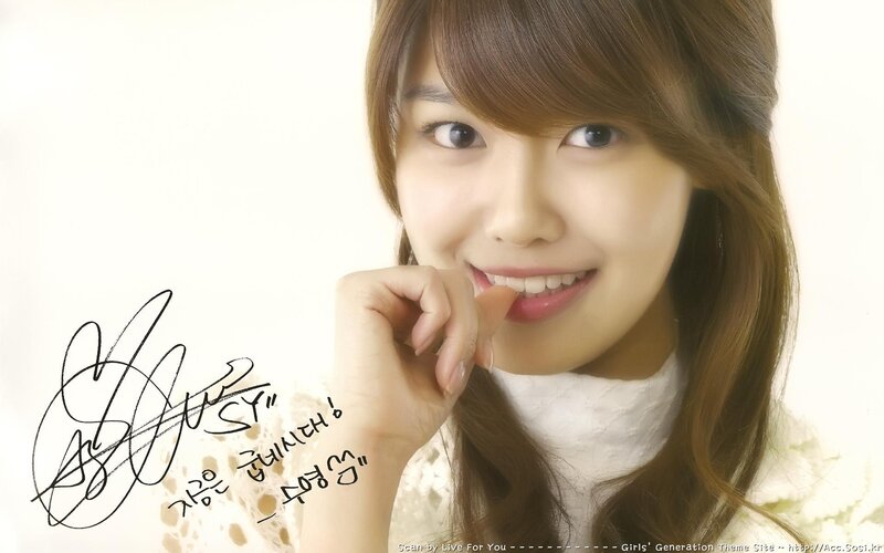 Smiling woman with signature