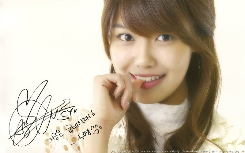 Smiling woman with signature