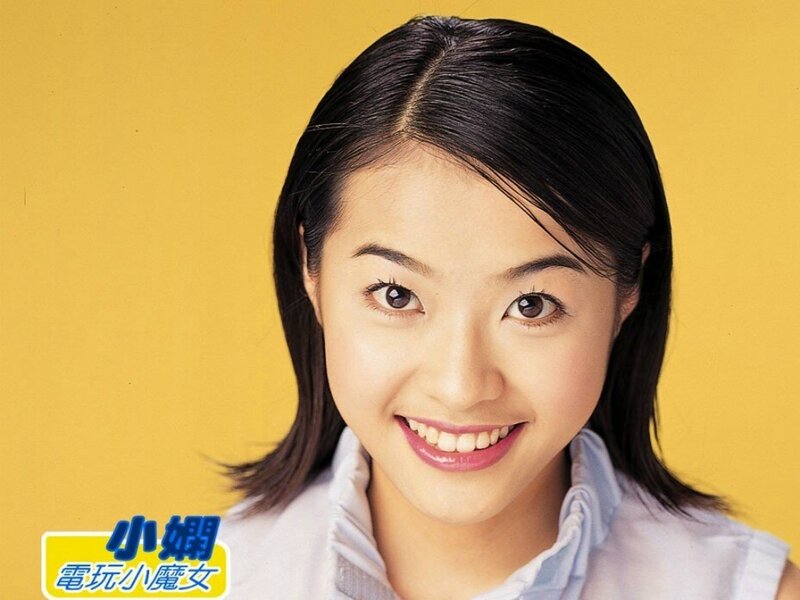 smiling woman with yellow background