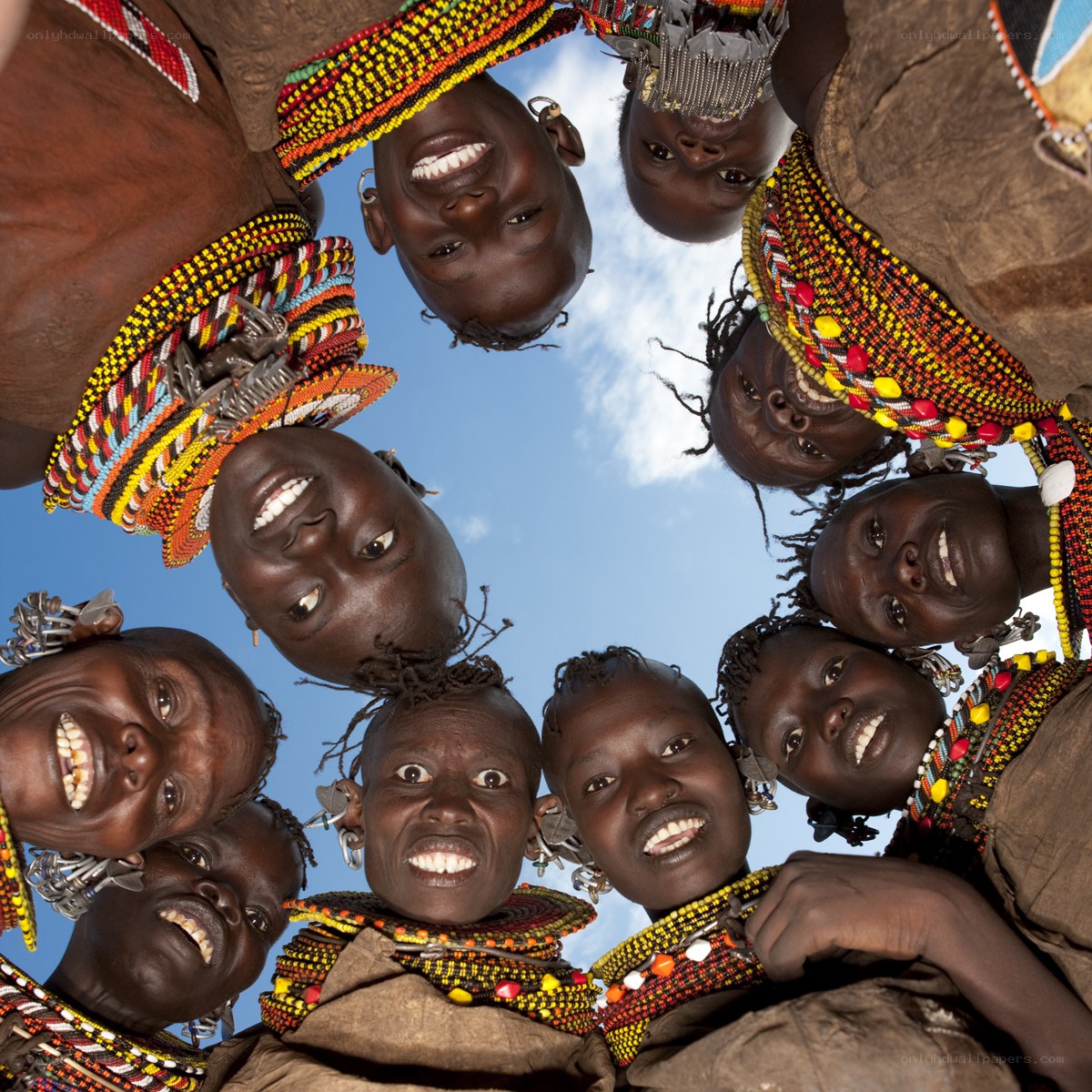 smiling women in a circle