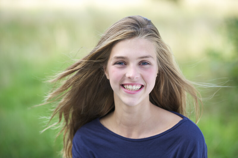 Smiling Young Woman — Blue