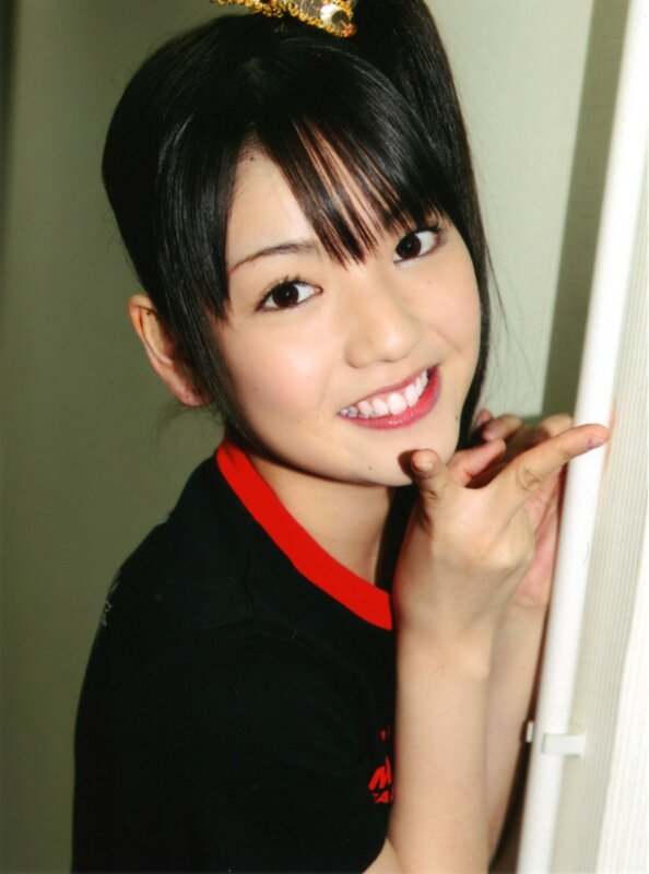 smiling young woman in black shirt