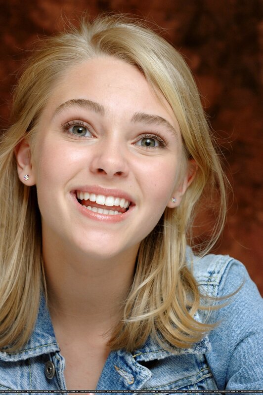 smiling young woman in denim jacket