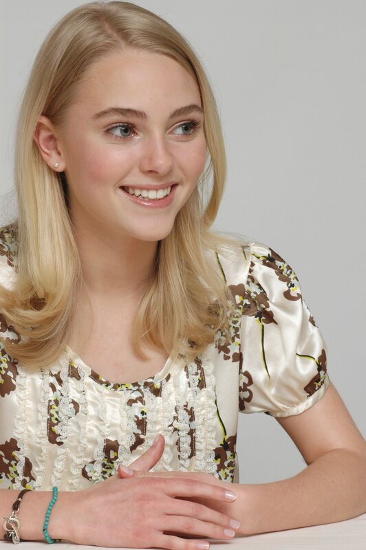 smiling young woman in floral dress