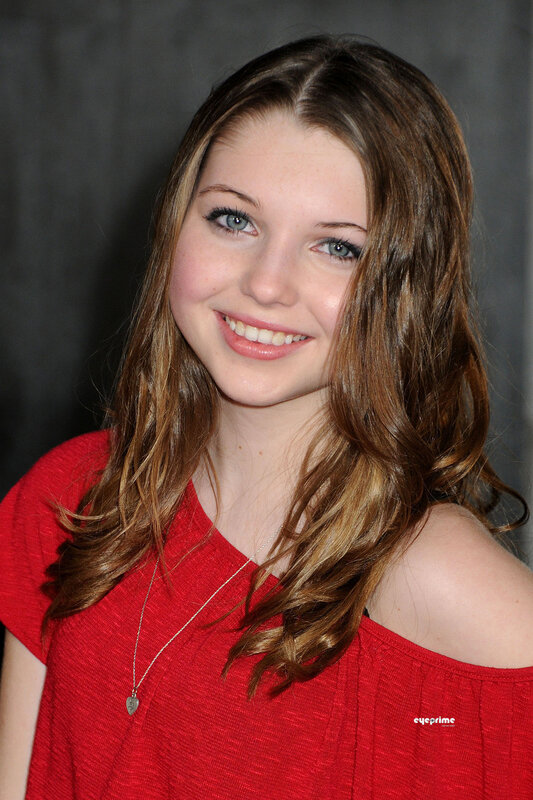 smiling young woman in red top
