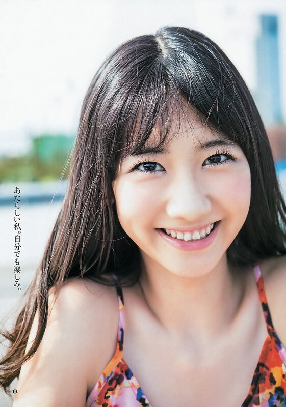 smiling young woman in swimsuit