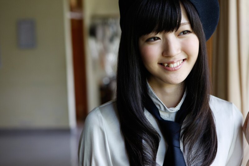 smiling young woman in uniform