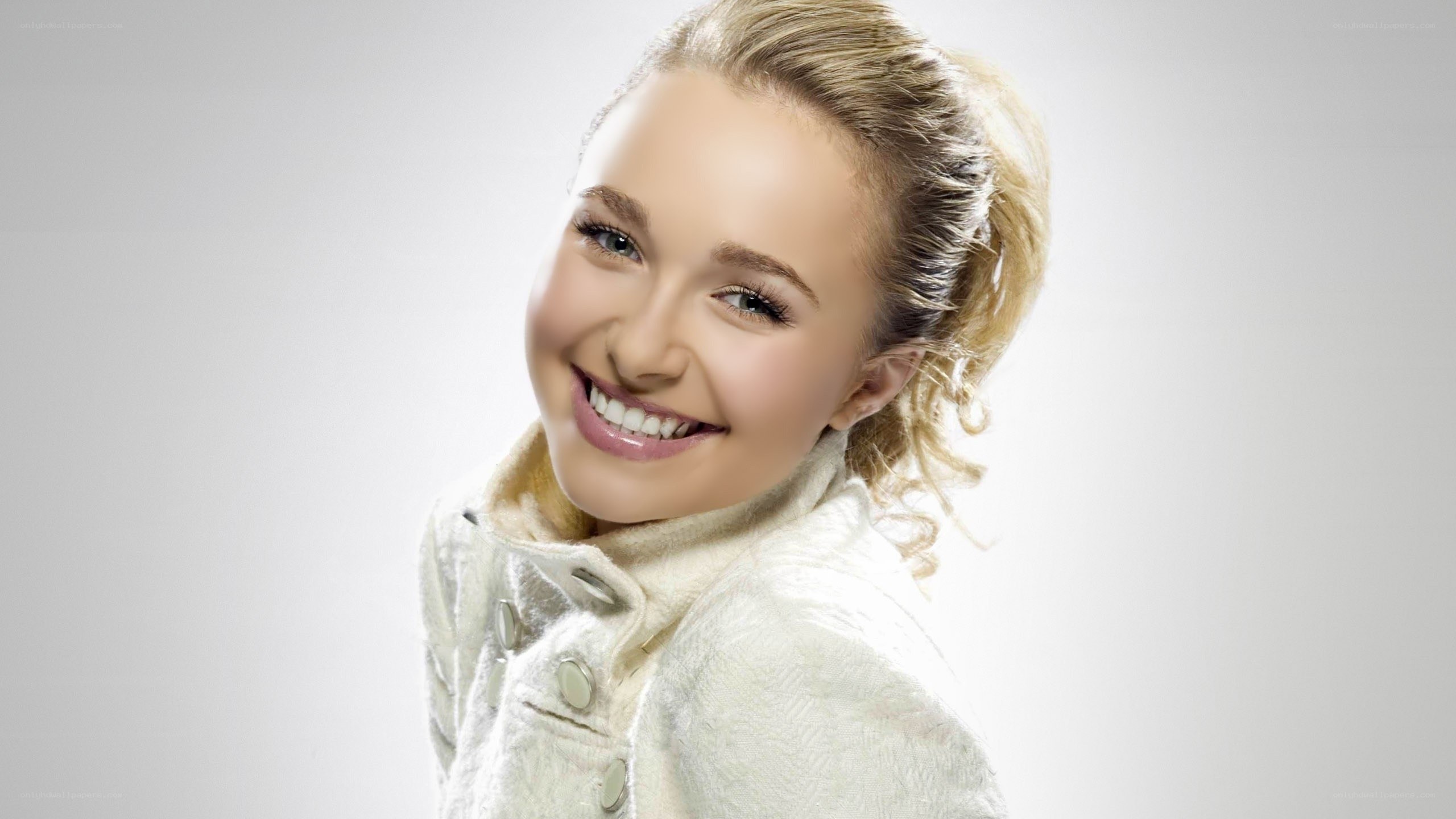 smiling young woman in white coat