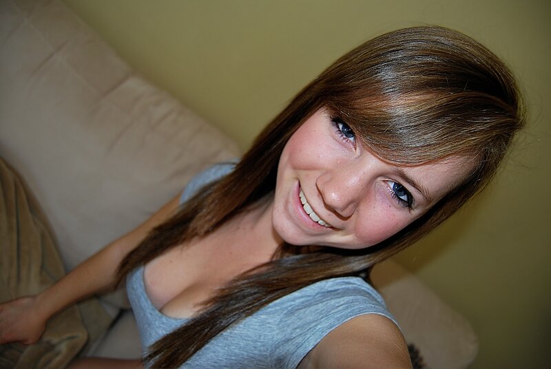 smiling young woman on couch