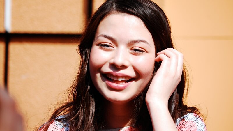 smiling young woman outdoors