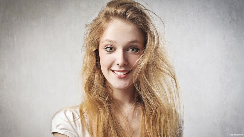 smiling young woman with blonde hair
