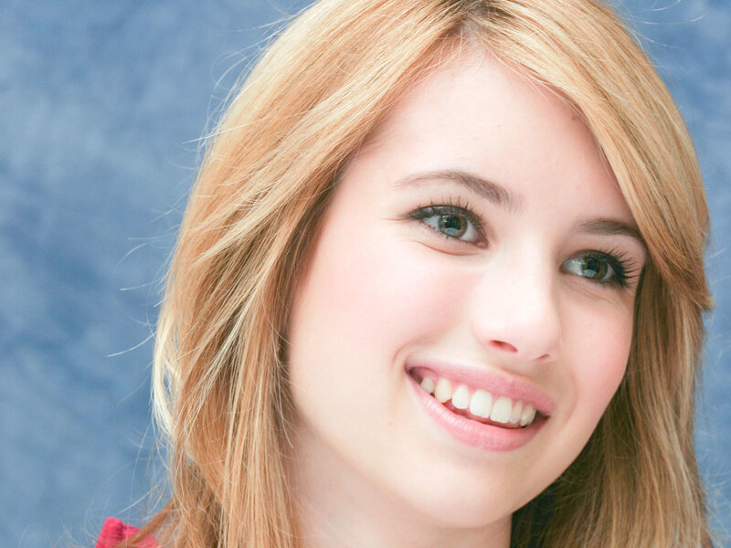 smiling young woman with blonde hair