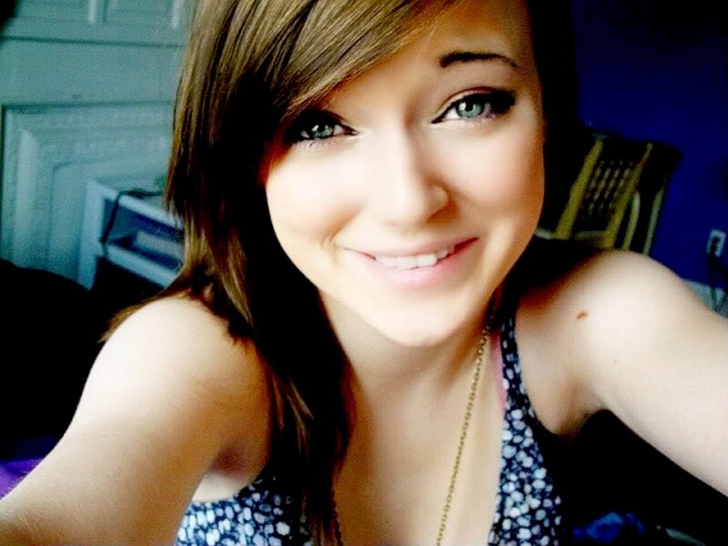 smiling young woman with blue eyes