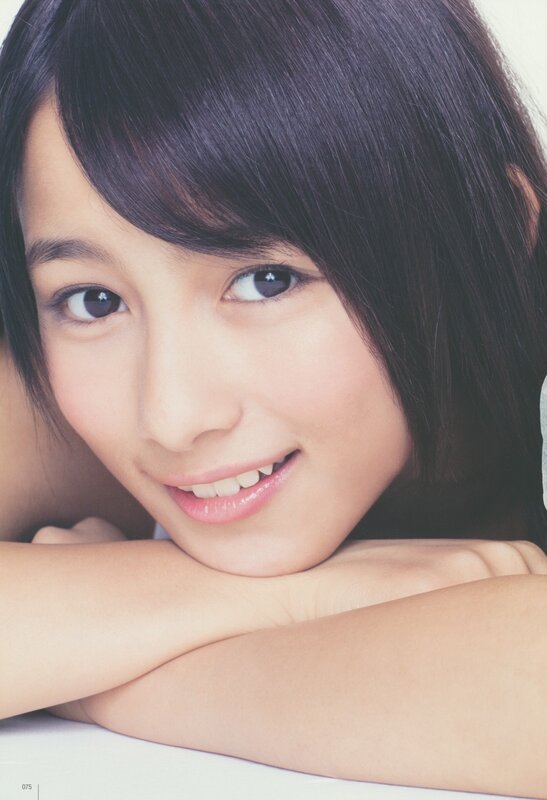 smiling young woman with dark hair