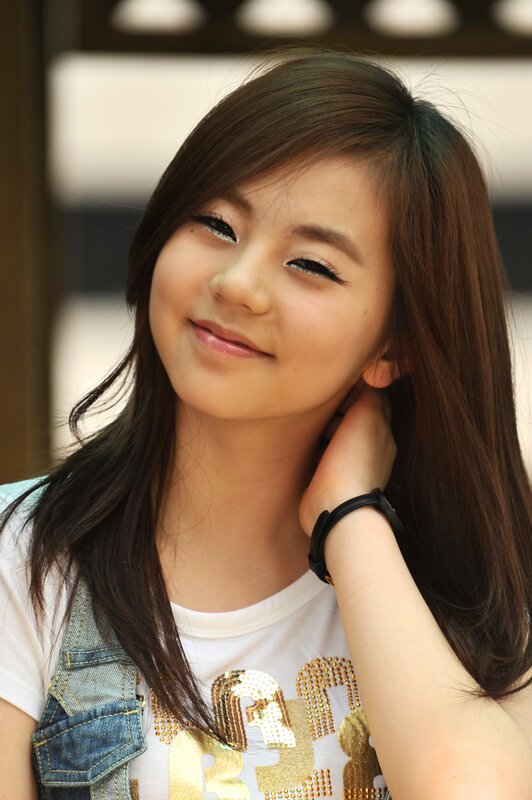 smiling young woman with long hair