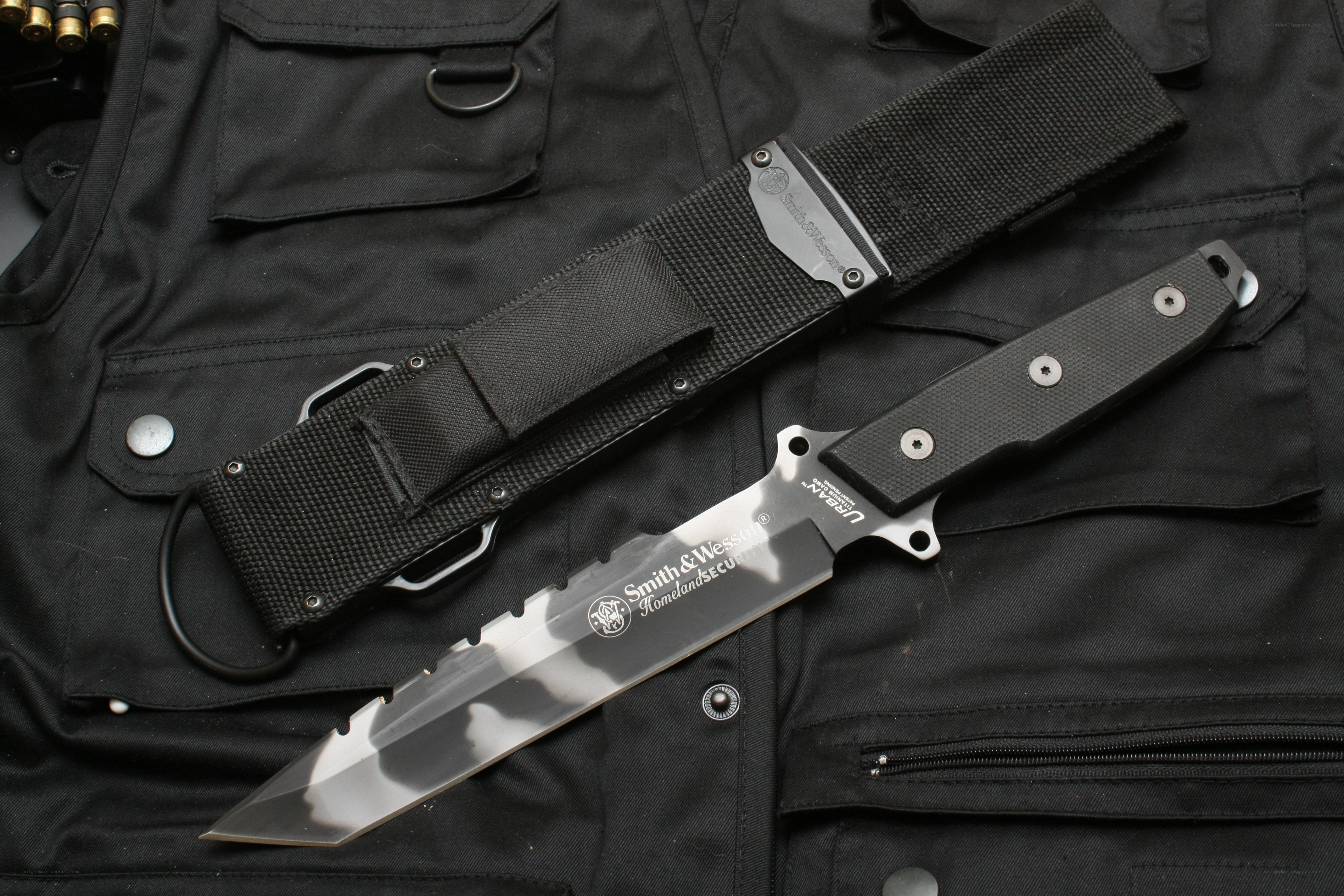 Smith & Wesson knife on tactical vest