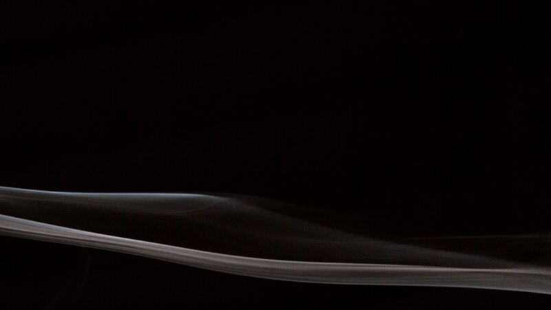 smoke against black background