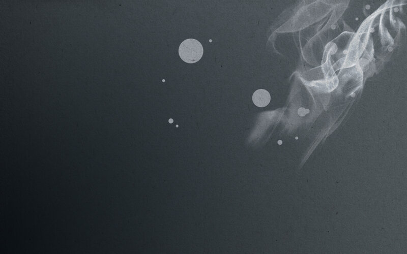 smoke and bubbles on dark background