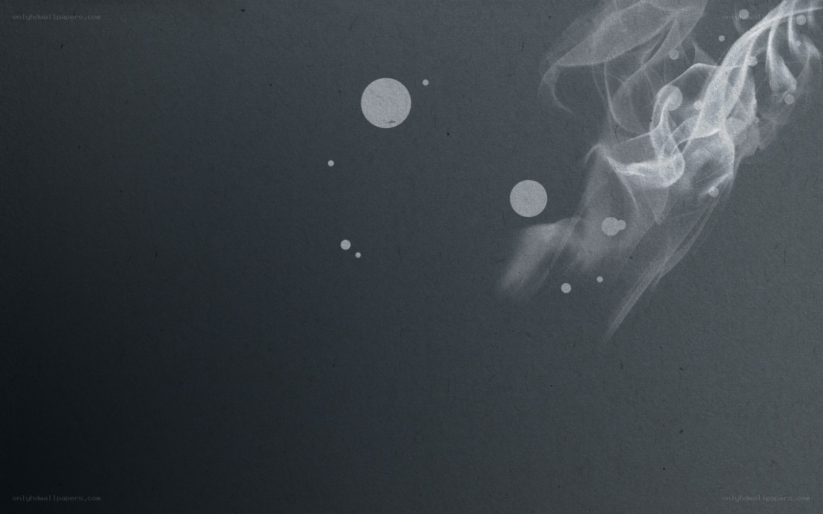 smoke and bubbles on dark background