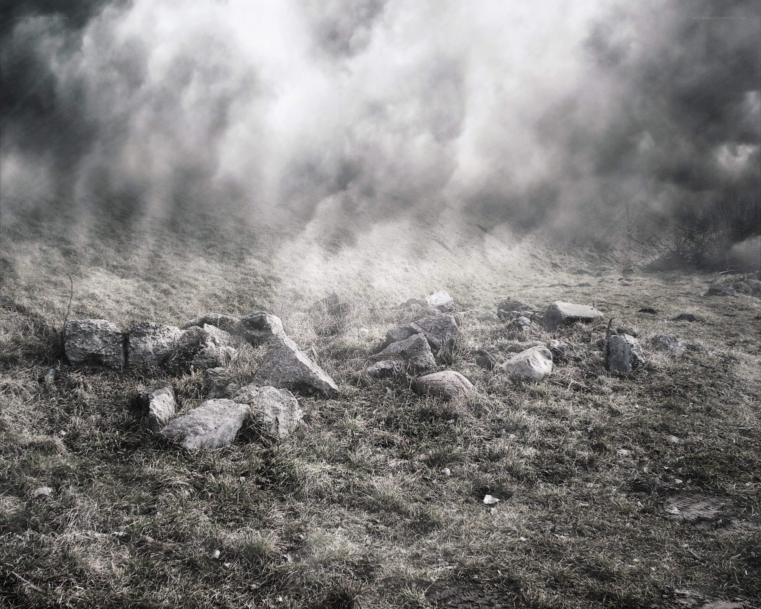 smoke over a rocky field
