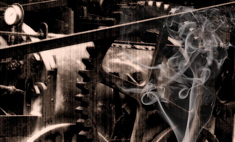 smoke over industrial gears