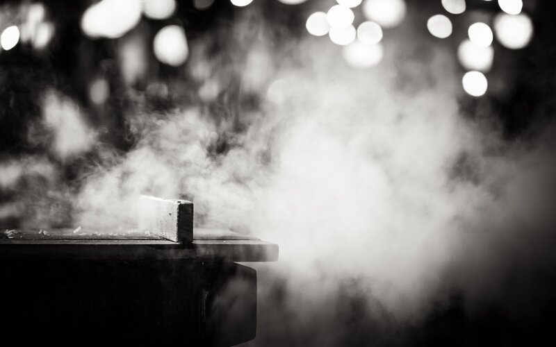 smoke rising from a grill
