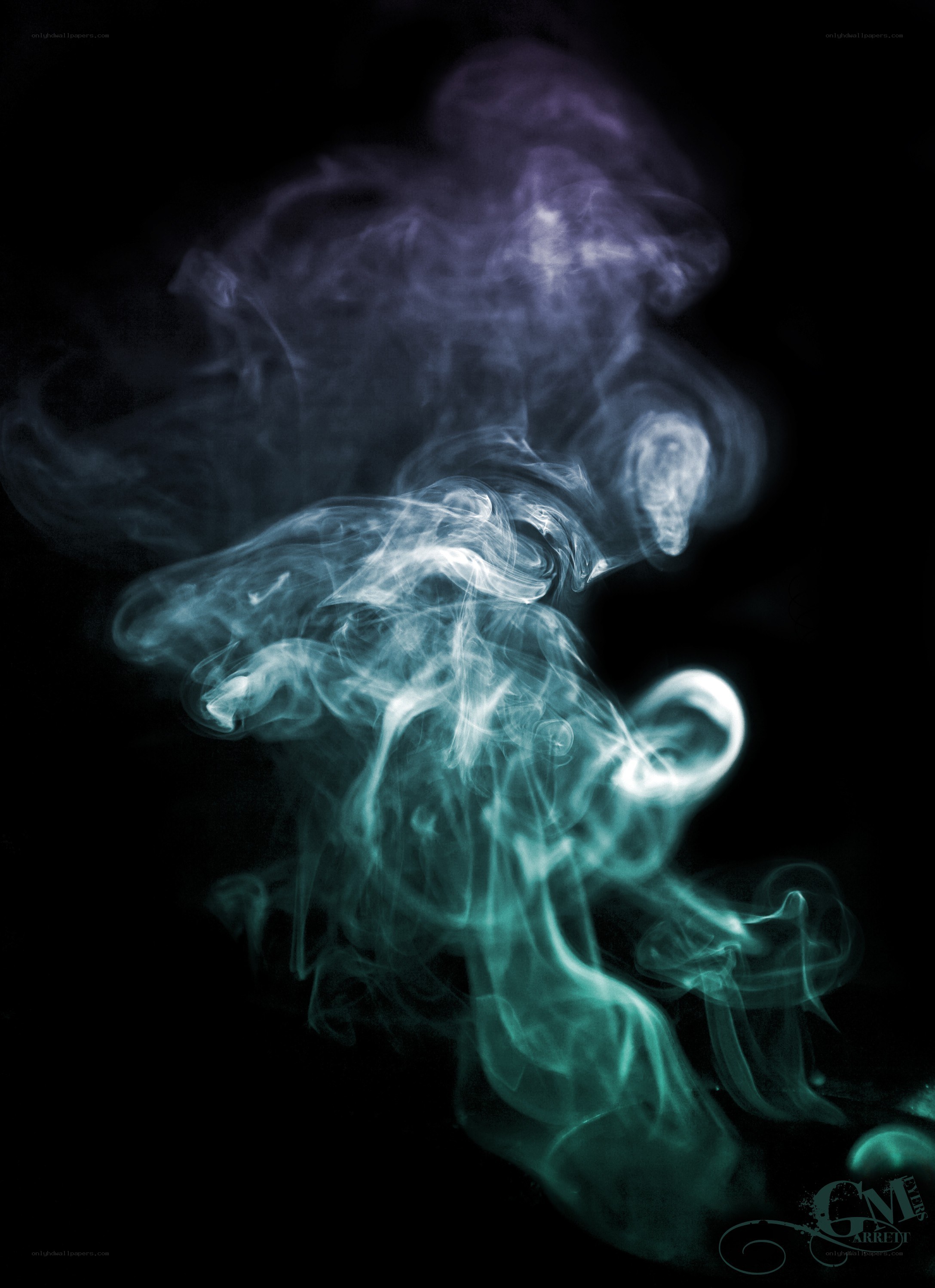 smoke swirls in dark