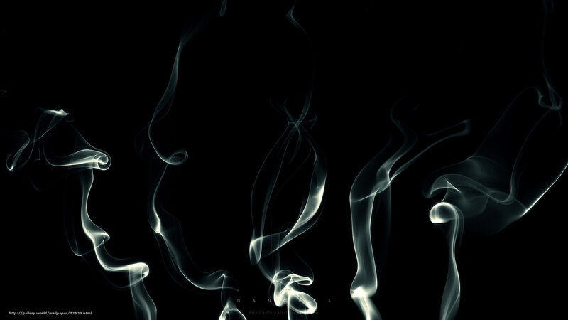 Smoke swirls on black