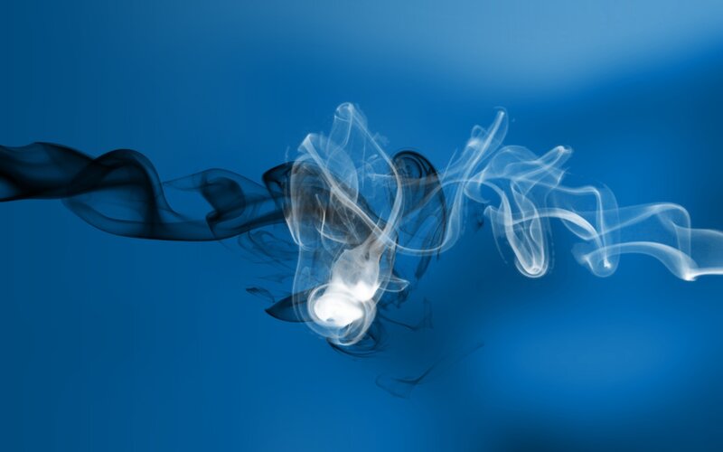 smoke swirls on blue